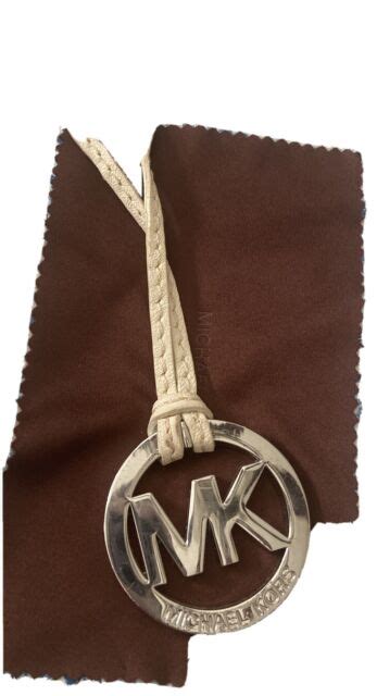 michael kors handbag charm medallion